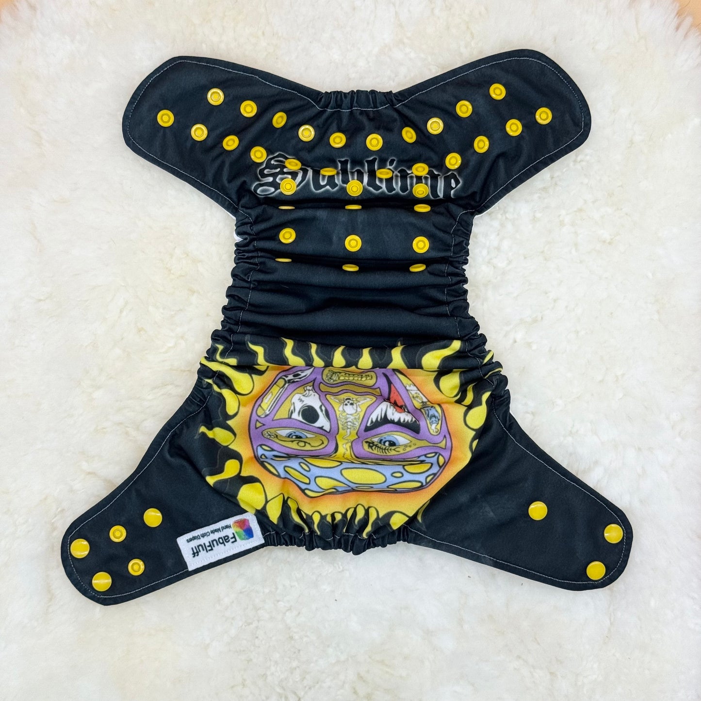 FabuFluff Sublime Sun Face on Black AWJ Pocket Diaper