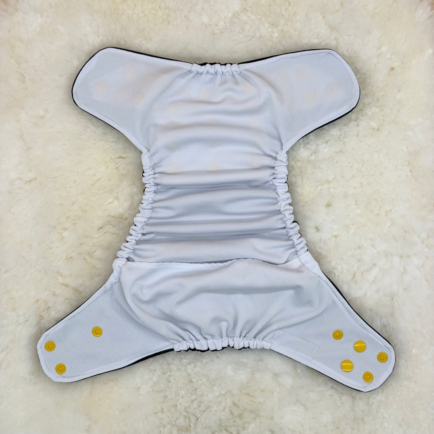 FabuFluff Sublime Sun Face on Black AWJ Pocket Diaper