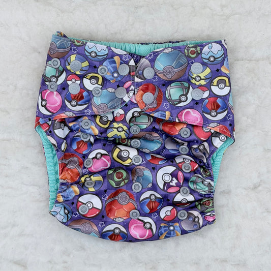 Sustainable Sprinkles Purple Catch Balls AWJ Pocket Diaper - Stained