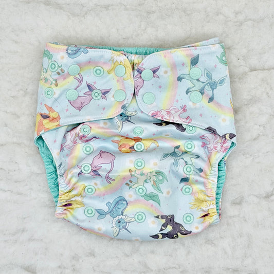 Sustainable Sprinkles Pastel Rainbow Critters AWJ Pocket Diaper - Stained