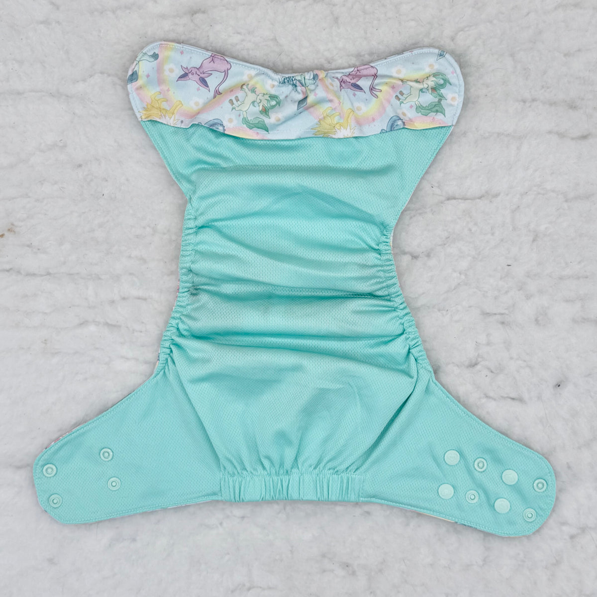 Sustainable Sprinkles Pastel Rainbow Critters AWJ Pocket Diaper - Stained
